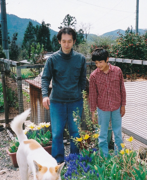 人物と犬の写真