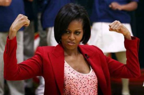 michelle_obama_u-s-_first_lady_michelle_obama_flexes_her_muscles_as_she_exercises_with_schoolchildren_at_the_river_terrace_school_april_21_2010_in_washington_dc-_mrs_0